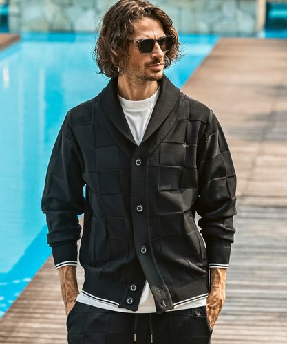 LUXEAKMPLUS(リュクスエイケイエムプラス)ゴルフ 総柄ロゴニットベスト