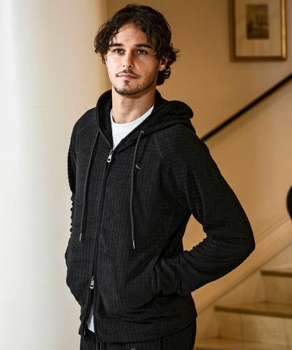 1PIU1UGUALE3 RELAX(ウノピゥウノウグァーレトレ リラックス)3ロゴ